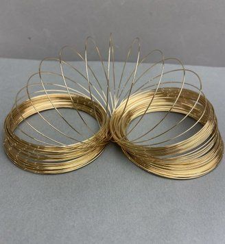 Проволока мемори толщина d-0.8mm, d- витка 6см (+-) золотистый металл цена за 100грамм 48563 фото